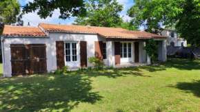 Maison à 8 min à pied de la Plage avec jardin clos et ombragé